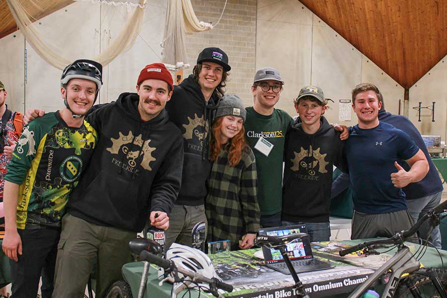 Students manning a table at the activities fair