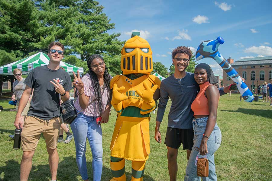 Students together with the golden knight