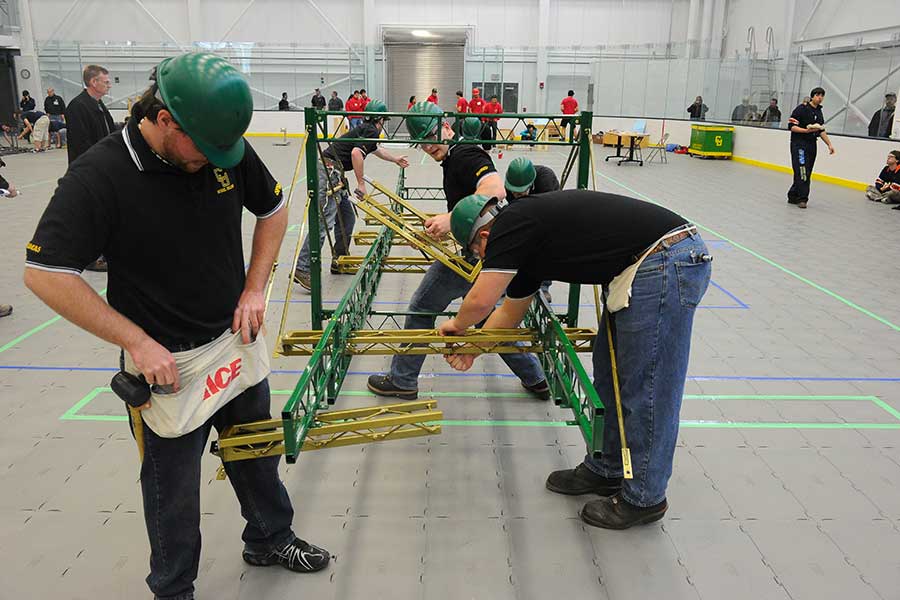 Students working on the steel bridge