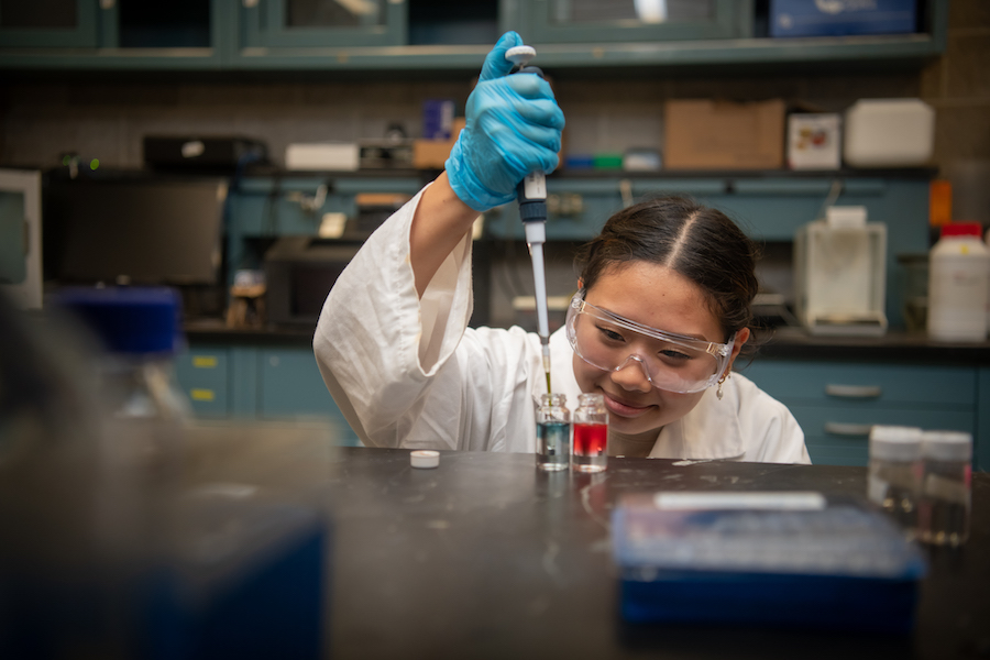 Female student in lab.