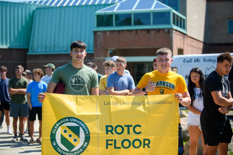 A photo of the fall 2024 ROTC living learning community holding a banner.