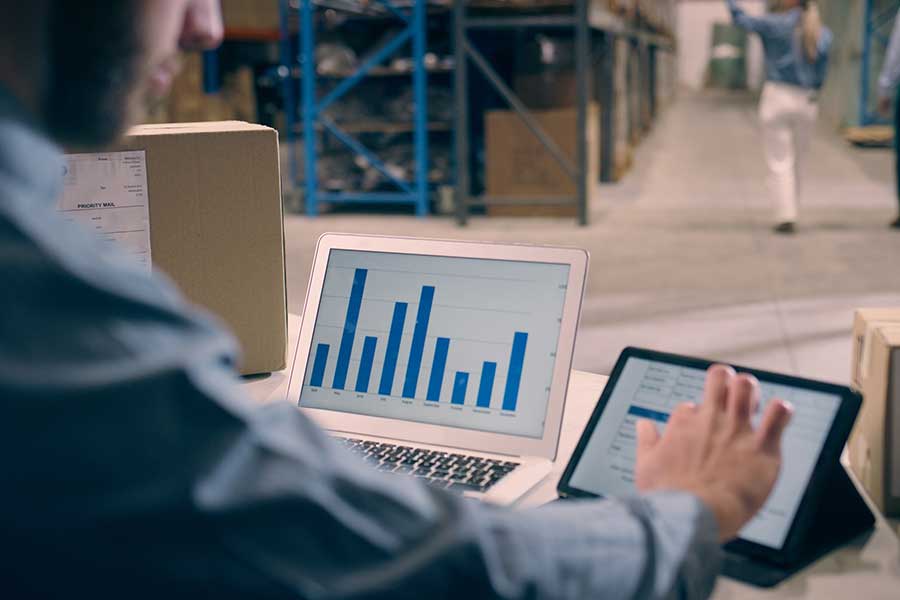 Individual looking at a data flow dashboard